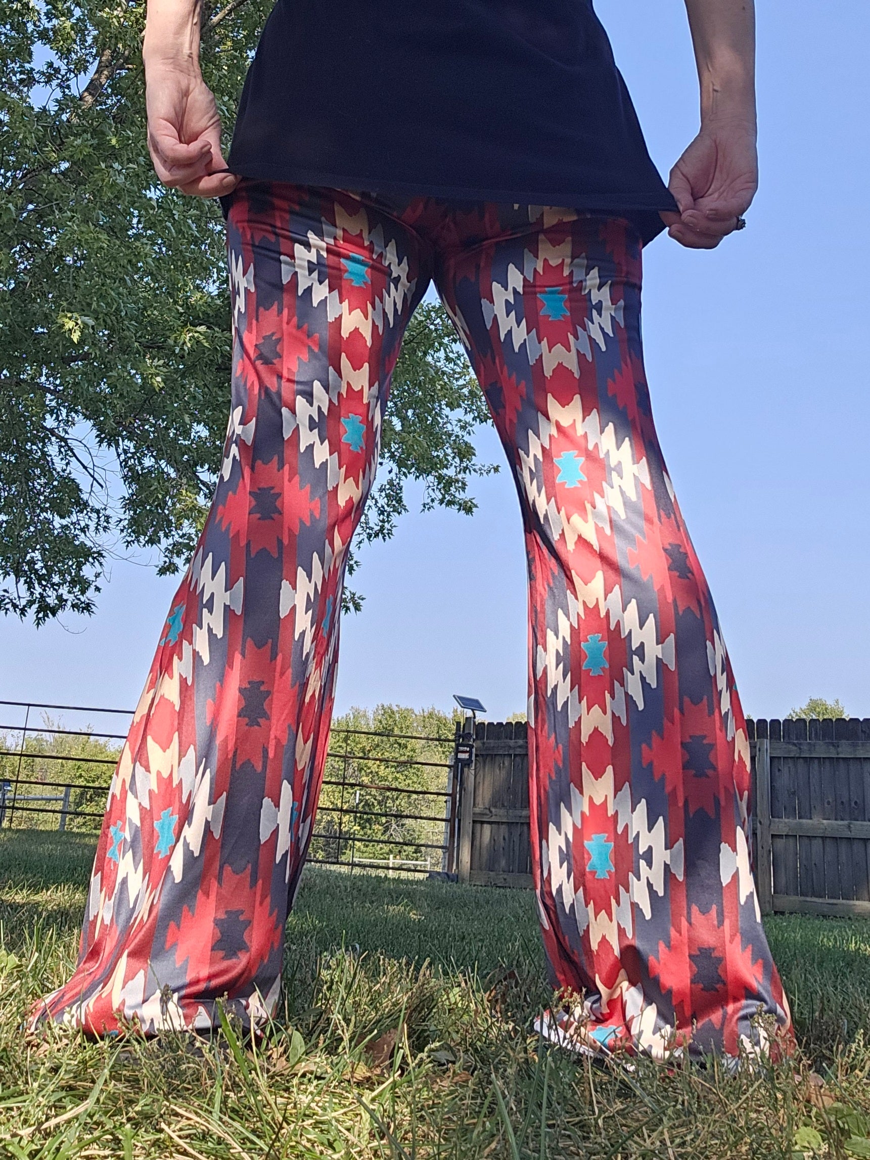 Back view of Sedona Aztec Flare Pants showcasing bold southwest-inspired pattern in vibrant colors.