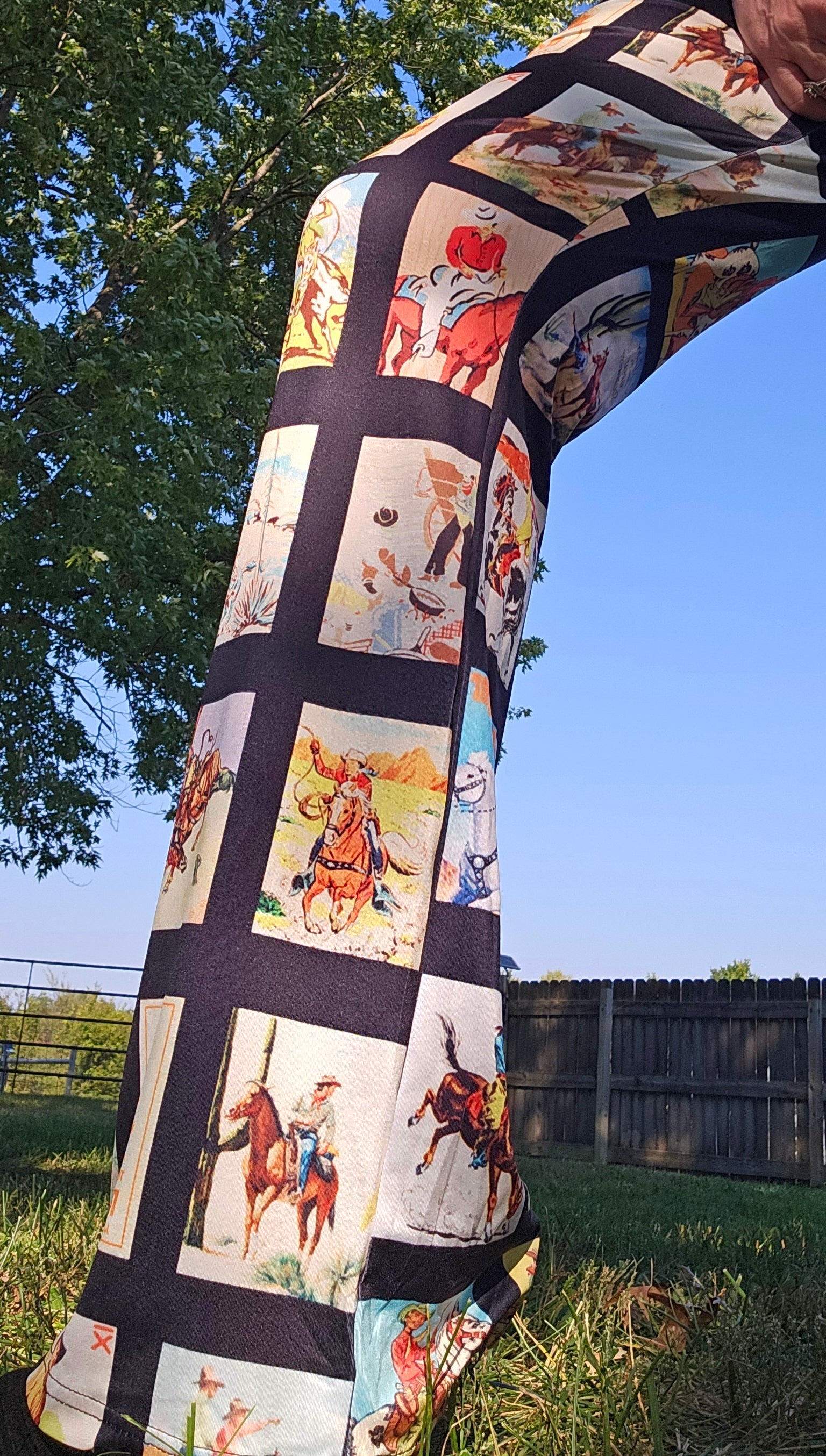 Vintage Cowboy Collage Western Flare Pants showcasing playful rodeo illustrations on soft fabric.