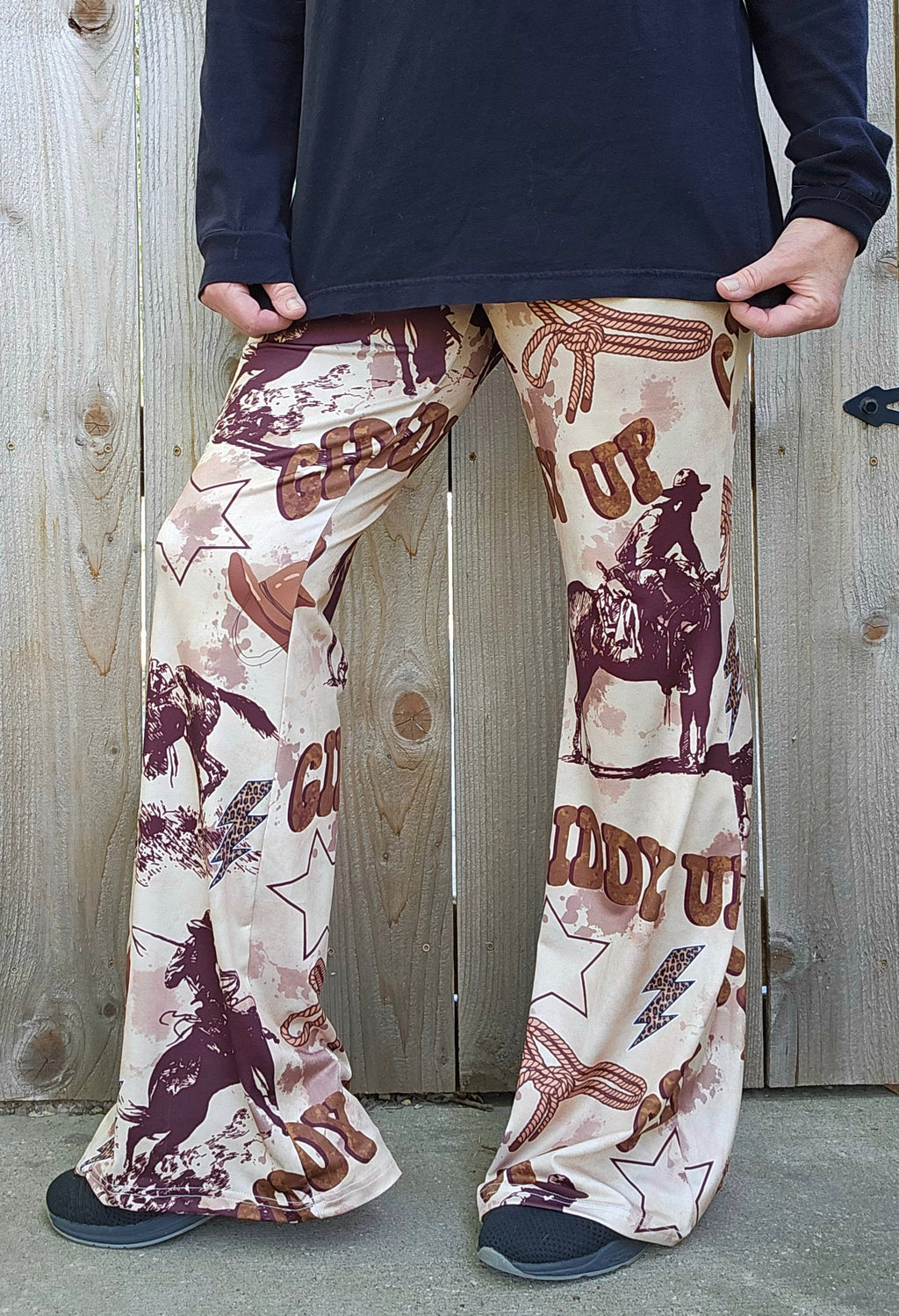 Cowboy Ranch Flare Pants featuring western prints, perfect for stylish and comfortable cowgirl looks.