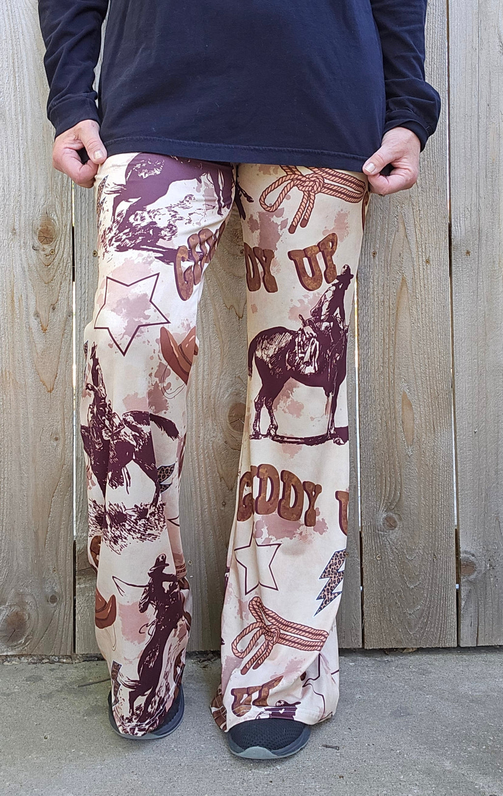 Cowboy Ranch Flare Pants featuring western print, perfect for stylish cowgirls seeking comfort and flair.