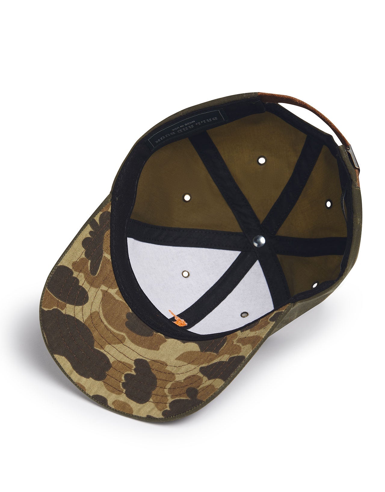 Interior view of the Arthur Field Waxed Cotton Hat showcasing its camouflage design and quality craftsmanship.