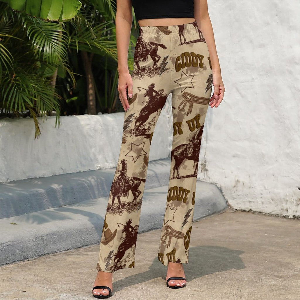 Stylish woman wearing Cowboy Ranch Flare Pants with cowboy and star print, perfect for modern cowgirls.