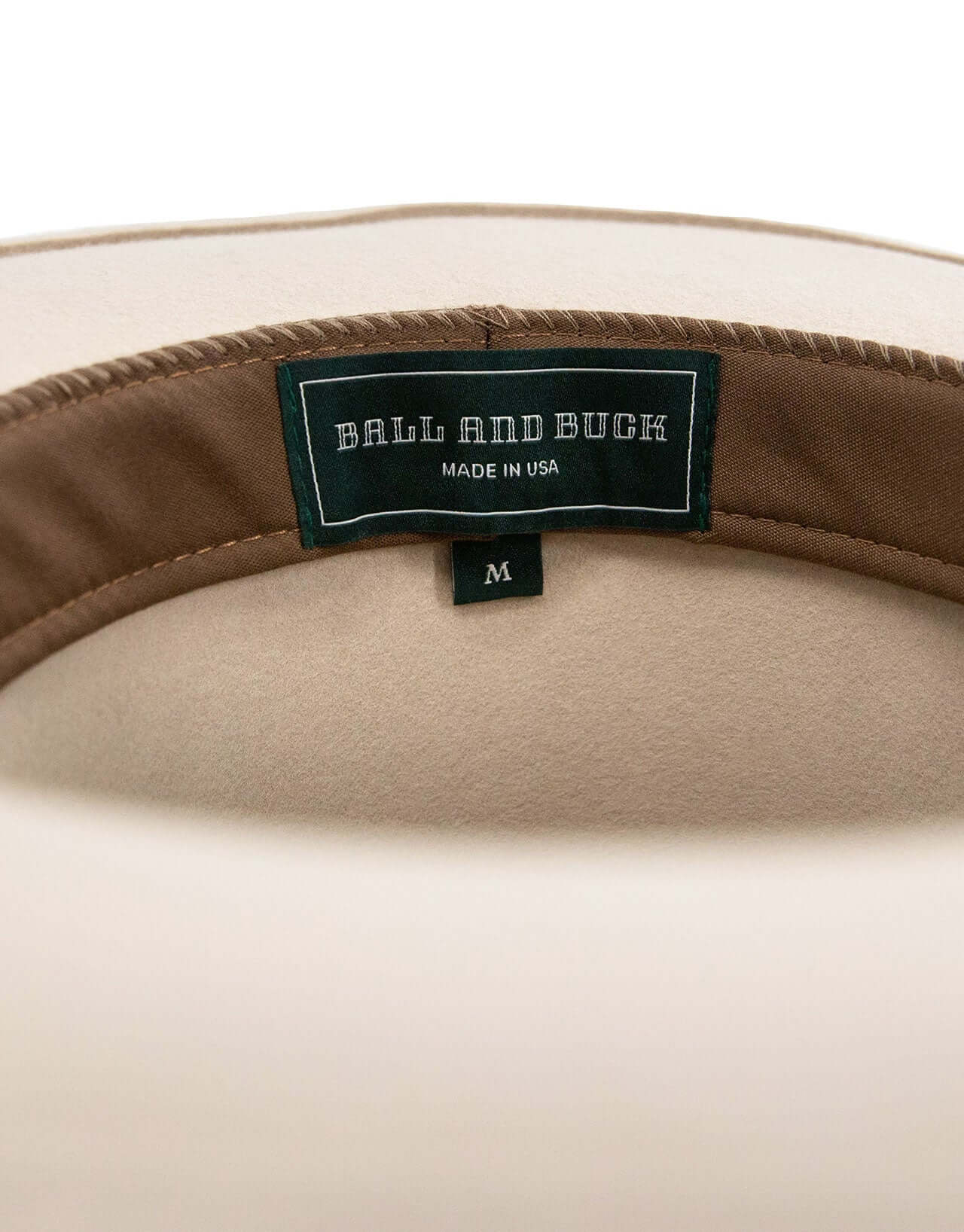 Inner label of the Ball and Buck Brimmed Field Hat highlighting 'Made in USA' and size M.