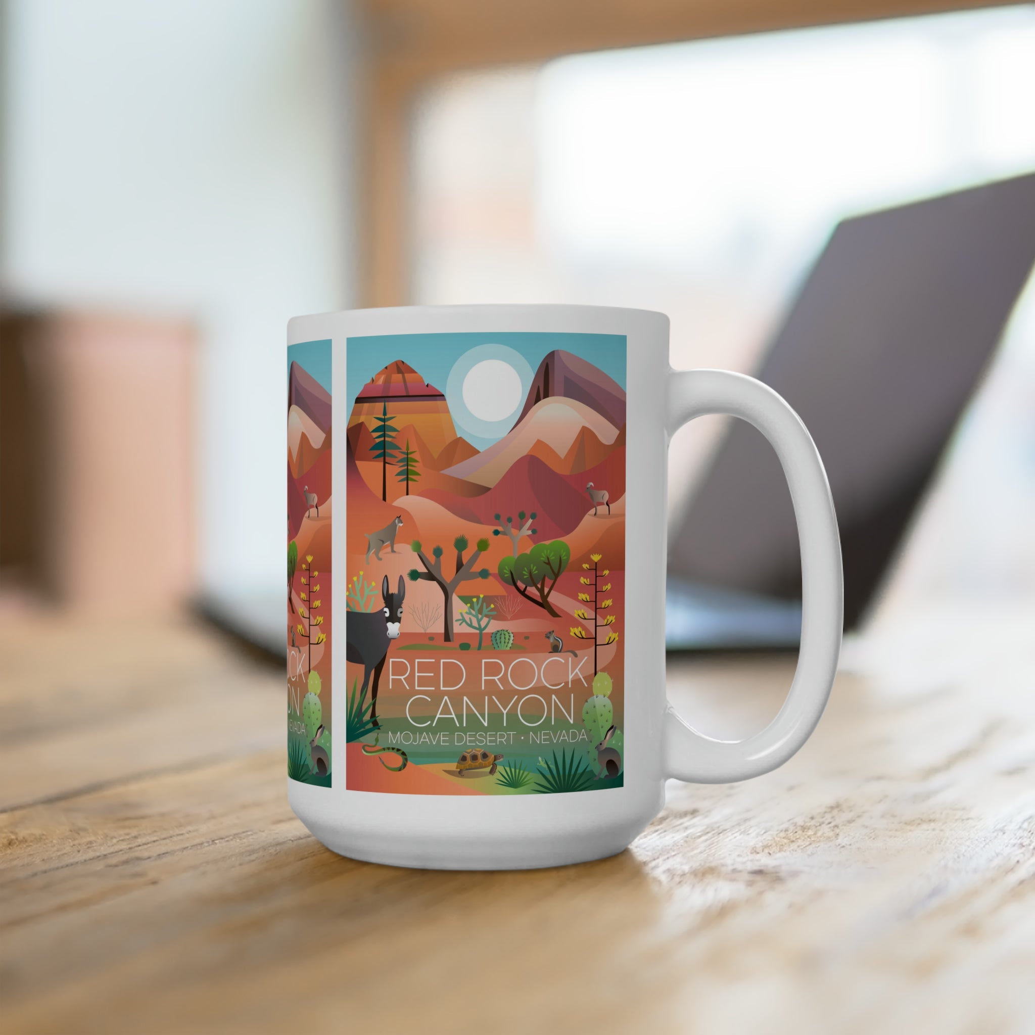 Red Rock Canyon ceramic mug featuring vibrant desert design, perfect for hot beverages, available in 11oz and 15oz sizes.