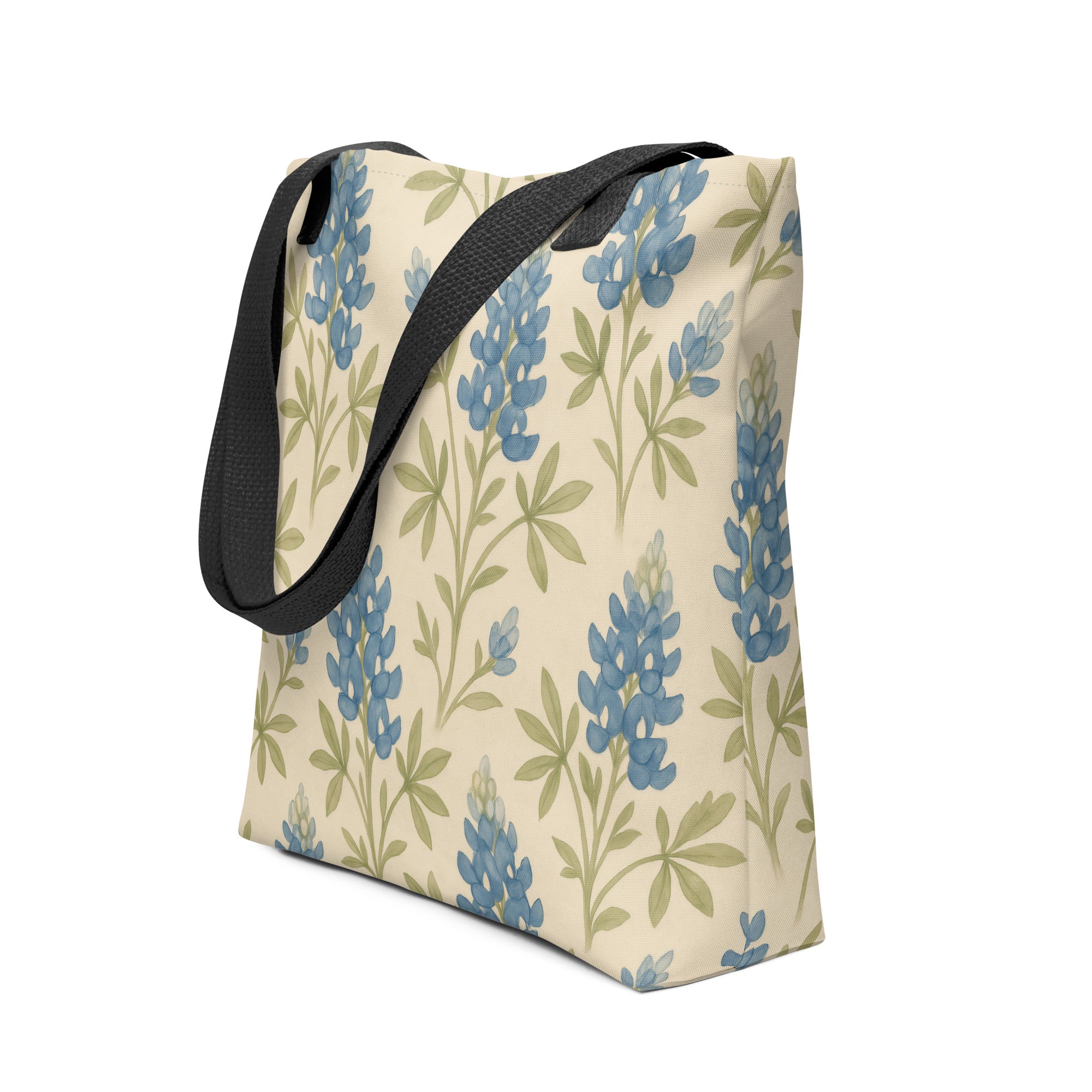 Elegant Bluebonnet tote bag with blue floral print, perfect for carrying essentials in style.
