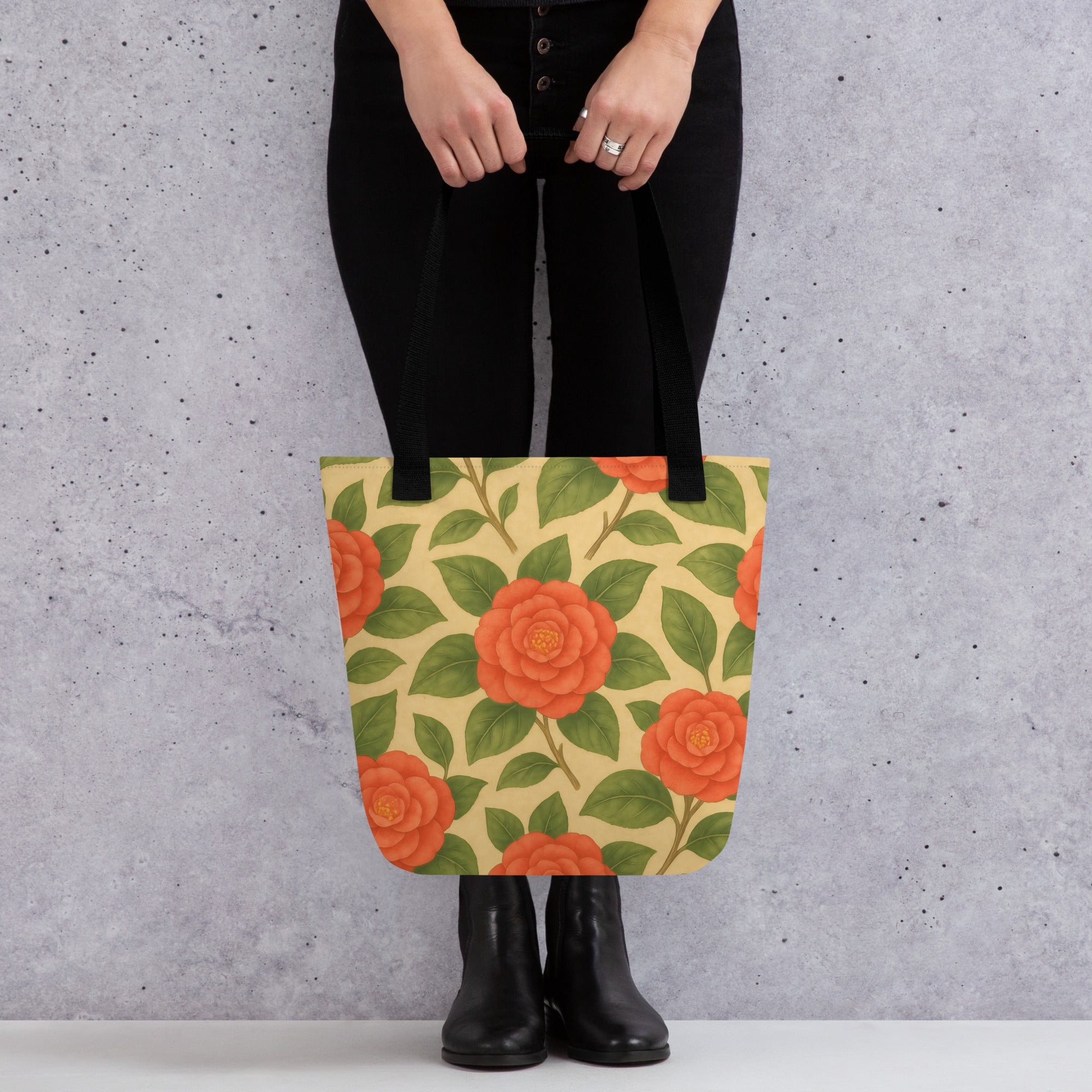 Camellia tote bag with vibrant orange flowers, perfect for carrying essentials in style.