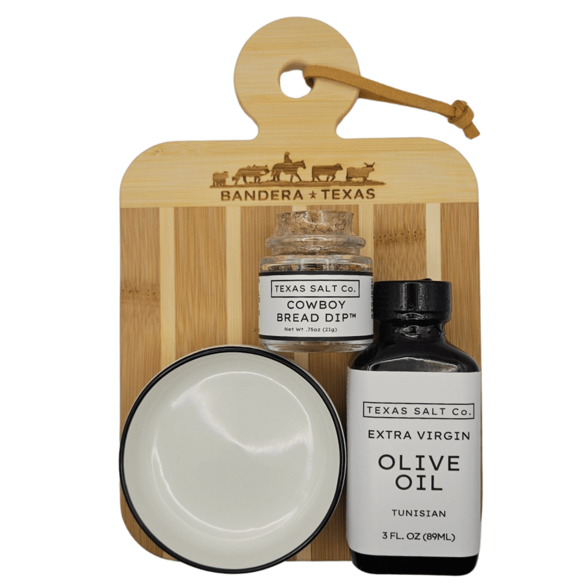 Delicious Bread Dip Gift Set with Cowboy Bread Dip, Olive Oil, and Dipping Bowl on a Wooden Board.