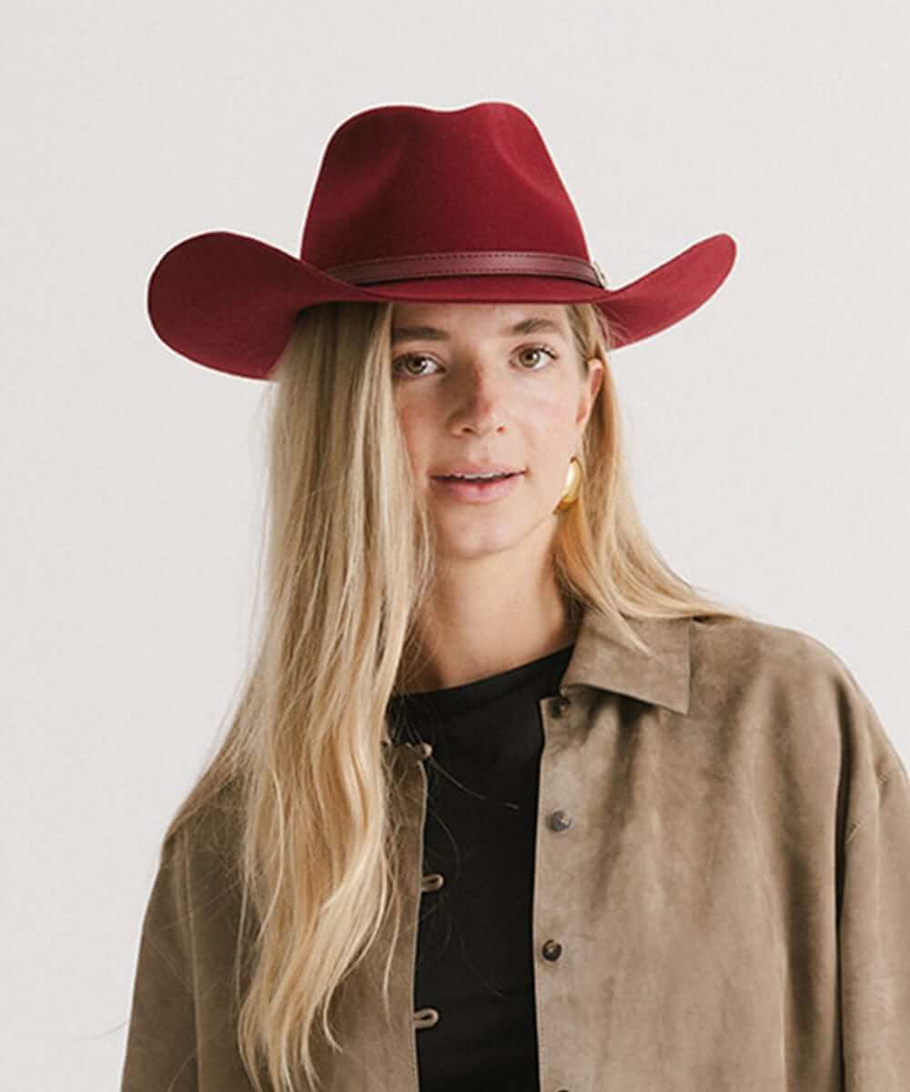 Dean Rancher Cowboy Hat in burgundy, featuring a sculpted crown and leather band, perfect for adding Western flair to outfits.