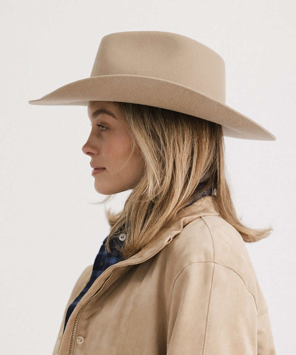 Dean Rancher Cowboy Hat in beige, a stylish women's Western hat with a sculpted crown and mid-length brim.