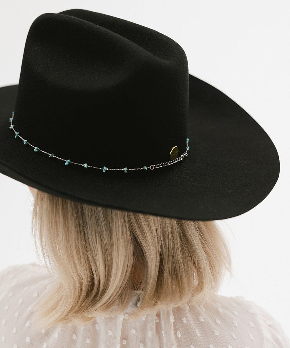 Black felt Teddy Cattleman cowboy hat with turquoise chain detail, perfect for any stylish cowgirl.