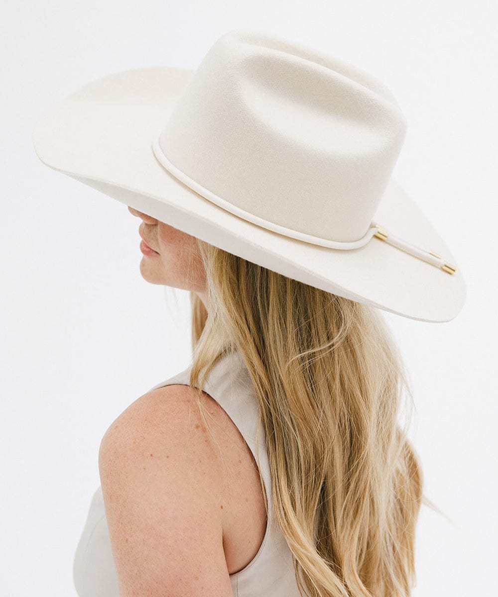 Model wearing a Teddy Cattleman Cowboy Hat, showcasing its classic western style and wide brim.