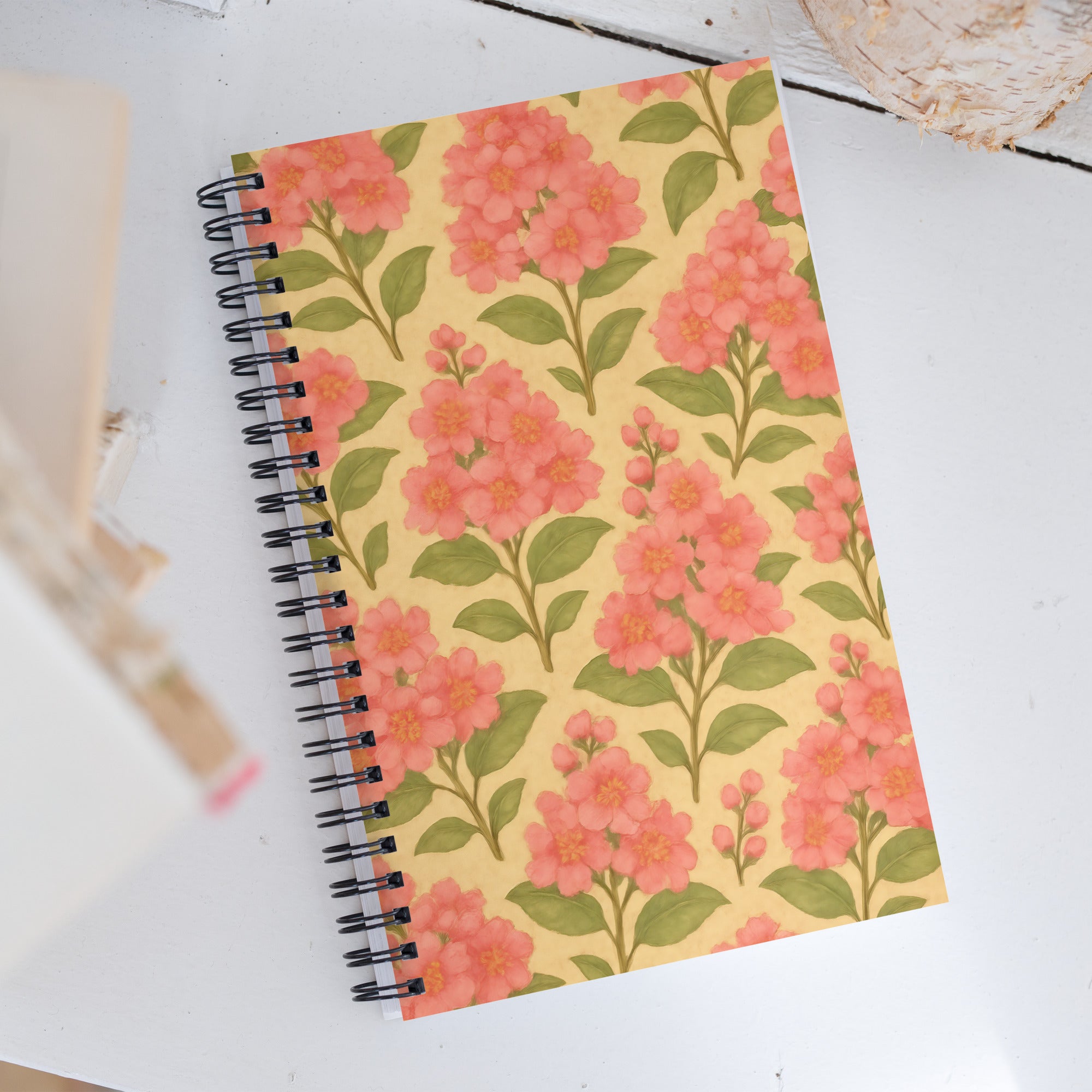 Crepe Myrtle spiral notebook with pink floral design on a yellow background, perfect for journaling and creative writing.
