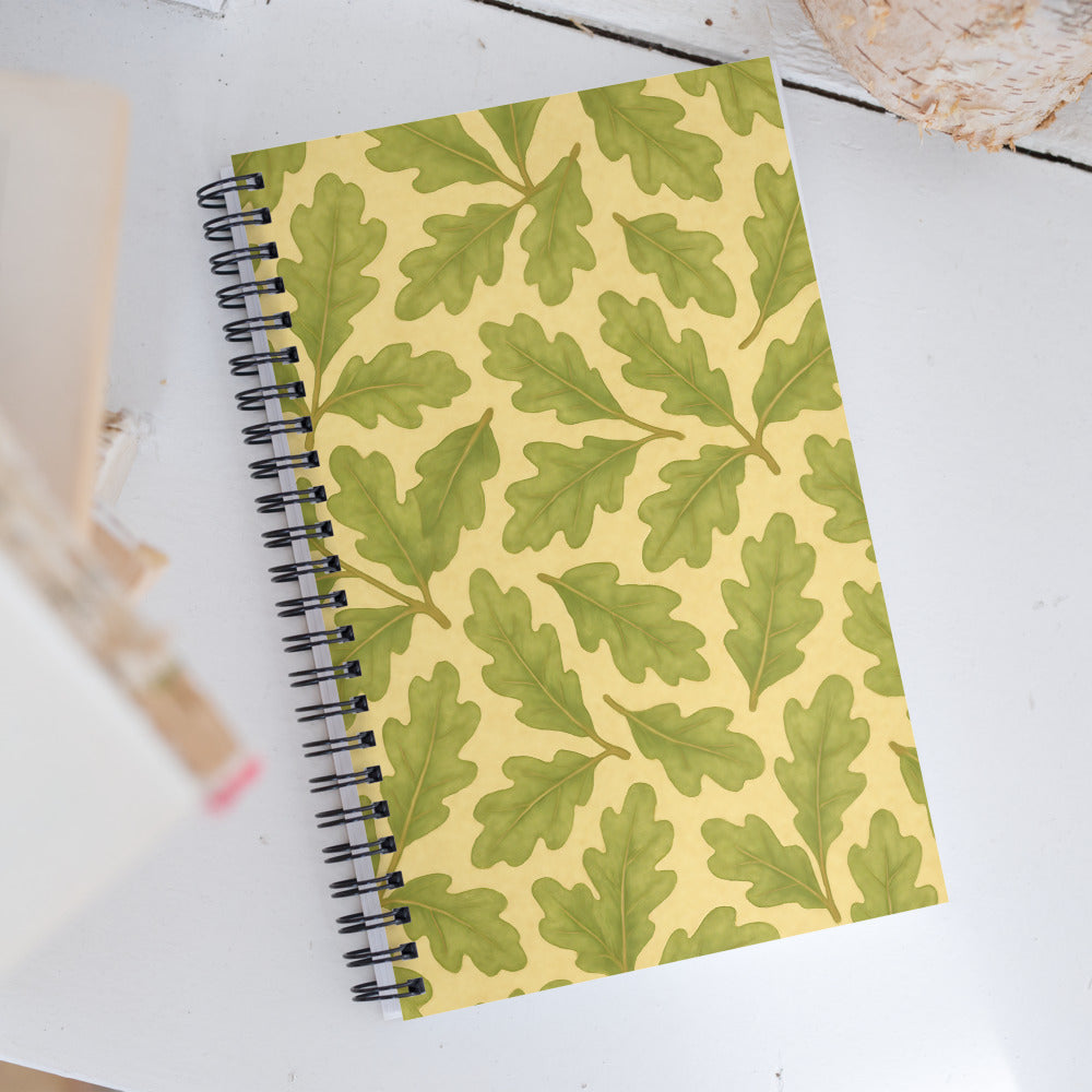 Live Oak Spiral Notebook with green leaf pattern on a yellow background, perfect for journaling and creative planning.