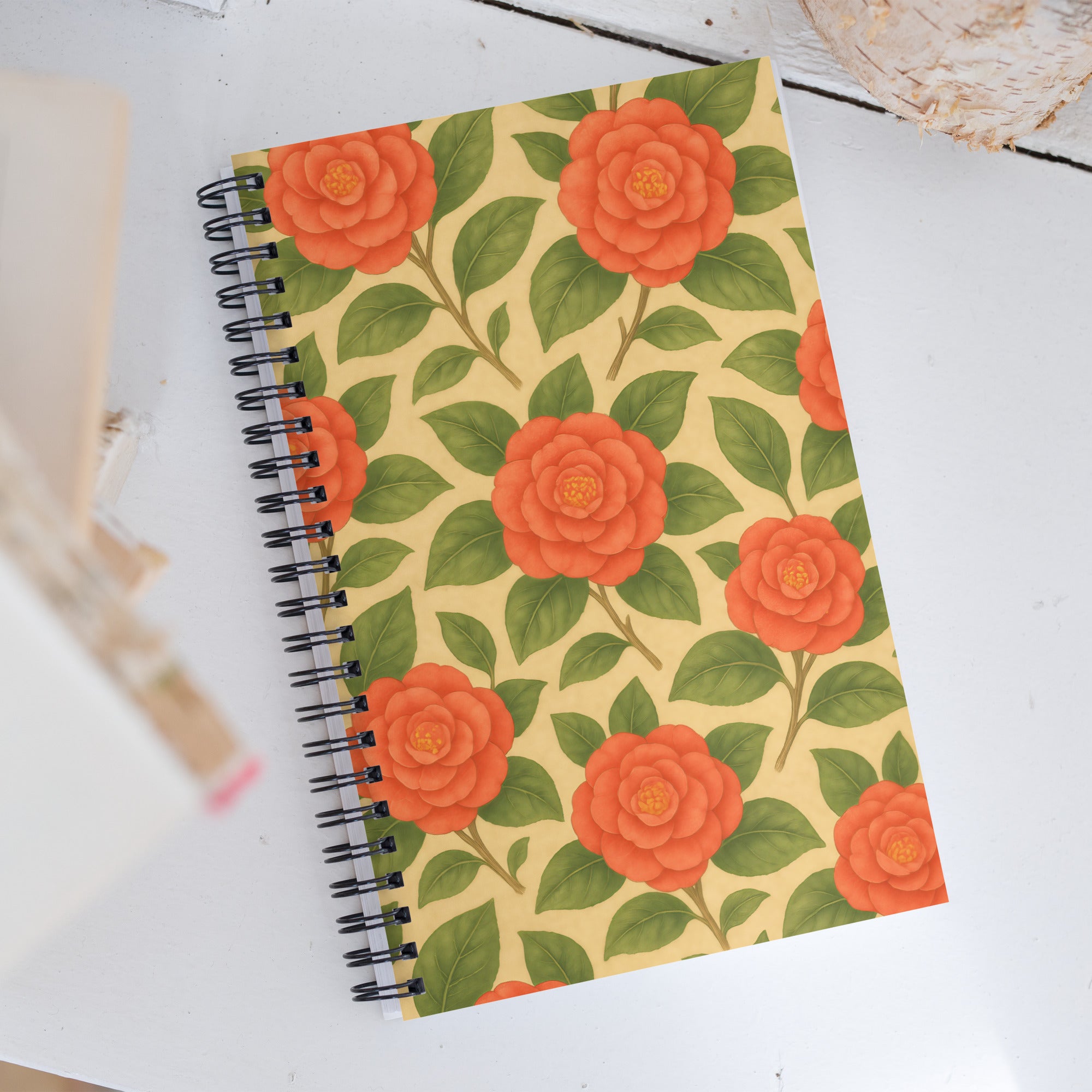 Camellia Spiral Notebook with floral pattern, perfect for jotting notes and artistic planning.