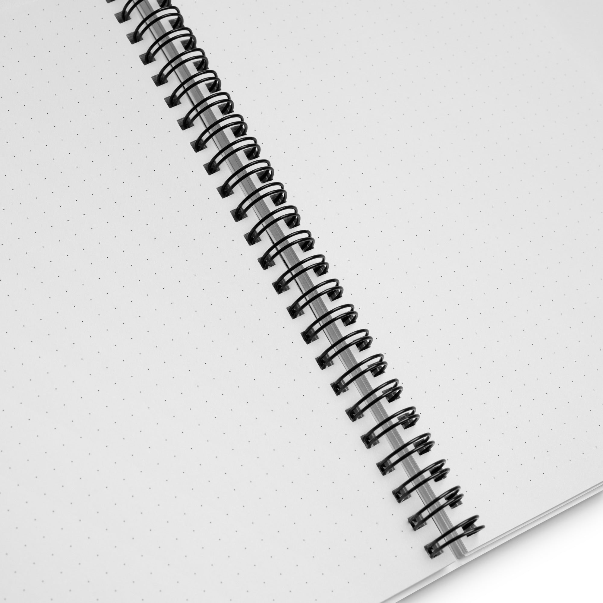 Open view of Bluebonnet Spiral Notebook with dotted pages, ideal for journaling and creativity.
